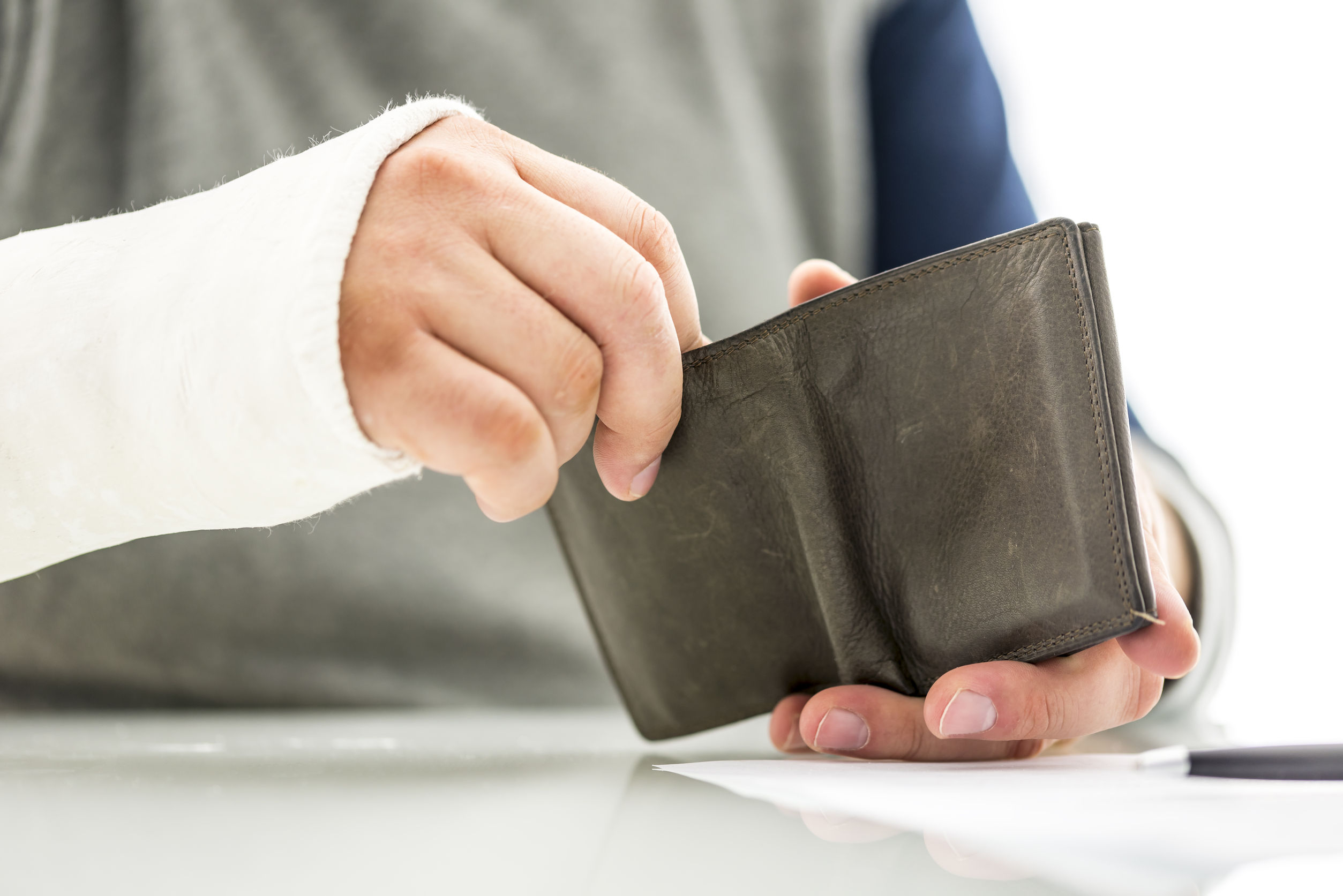 Patient paying for his medical bill for the accident out of his pocket