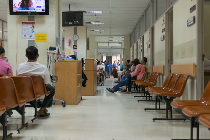 patients with government health care waiting to see the doctors in a government hospital in Thailand